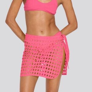 Solid and striped eyelet mini wrap in hot pink